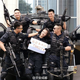 Image for article titled Chinese SWAT Team Recruits With Smiles And Crossbows